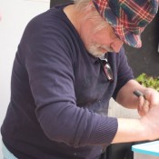 Alain working on one of his masterpieces at Mache des Enfants Rouge in Paris. Photo by alphacityguides.