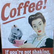Vintage coffee sign at Hell's Kitchen Market in New York. Photo by alphacityguides.