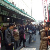 Busy Tsukiji Market in Tokyo. Photo by alphacityguides.