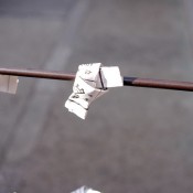 Tied Omikuji fortunes at Sensoji Temple in Tokyo. Photo by alphacityguides.