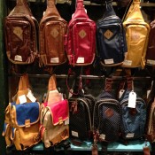 Backpack wall at Wego Harajuku in Tokyo. Photo by alphacityguides.