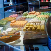 Colorful macarons at Pierre Hermé in Paris. Photo by alphacityguides.