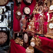Vintage clock display at the Portobello Market in London. Photo by alphacityguides.