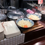 Udon with raw egg at Muginbo in Tokyo. Photo by alphacityguides.