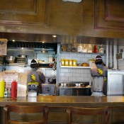 Grill and fry station at Shake em Buns in Hong Kong. Photo by alphacityguides.