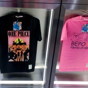 T-shirt display inside Uniqlo in Tokyo. Photo by alphacityguides.