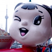 Noodle girl in Toronto's Chinatown. Photo by alphacityguides.