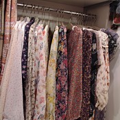 Vintage floral dresses at Lost and Found in Tokyo. Photo by alphacityguides.