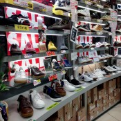 Sneakers wall at Asbee in Tokyo. Photo by alphacityguides.