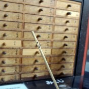 Omikuji fortune sticks and drawers at Sensoji Temple in Tokyo. Photo by alphacityguides.