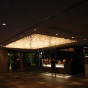 Front desk and Paul Hevin in Omotesando Hills department store in Tokyo. Photo by alphacityguides.