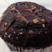 Salted caramel chocolate cupcake at Crumbs Bake Shop in New York. Photo by alphacityguides.